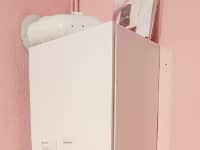 Boiler installation on a very pink wall!