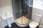 The new bathroom installed. Including washing hand basin, new shower and toiler in Liverpool