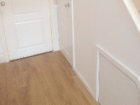 Understairs cupboard converted into a bathroom.