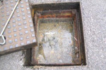 Blocked man hole causing the toilet in a property to back up