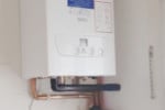 Replacement and reallocation of boiler from a dangerous postion in the property.