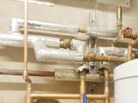 Commercial boiler and unvented cylinder installation.