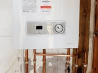 Glowworm boiler fitted with vertical flue.