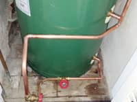 Hot water cylinder with immersions.