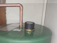 Hot water cylinder with immersions.