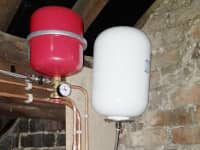 Hot water cylinder fitted in loft area.