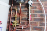 Power flushing a central heating system to remove sludge and blockages